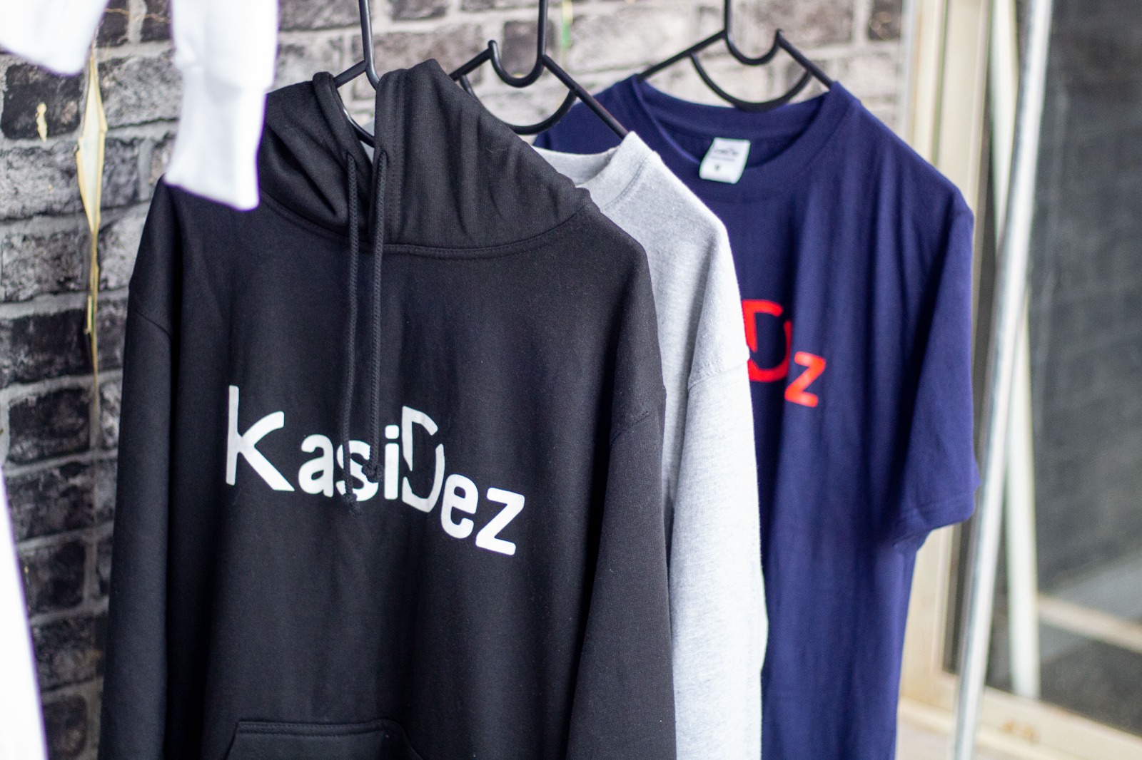 KasiDez hoodie and tees on the rack